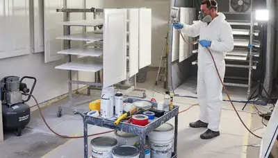 Professional cabinet painting in Tucson AZ using spray and brush for smooth, durable kitchen finishes